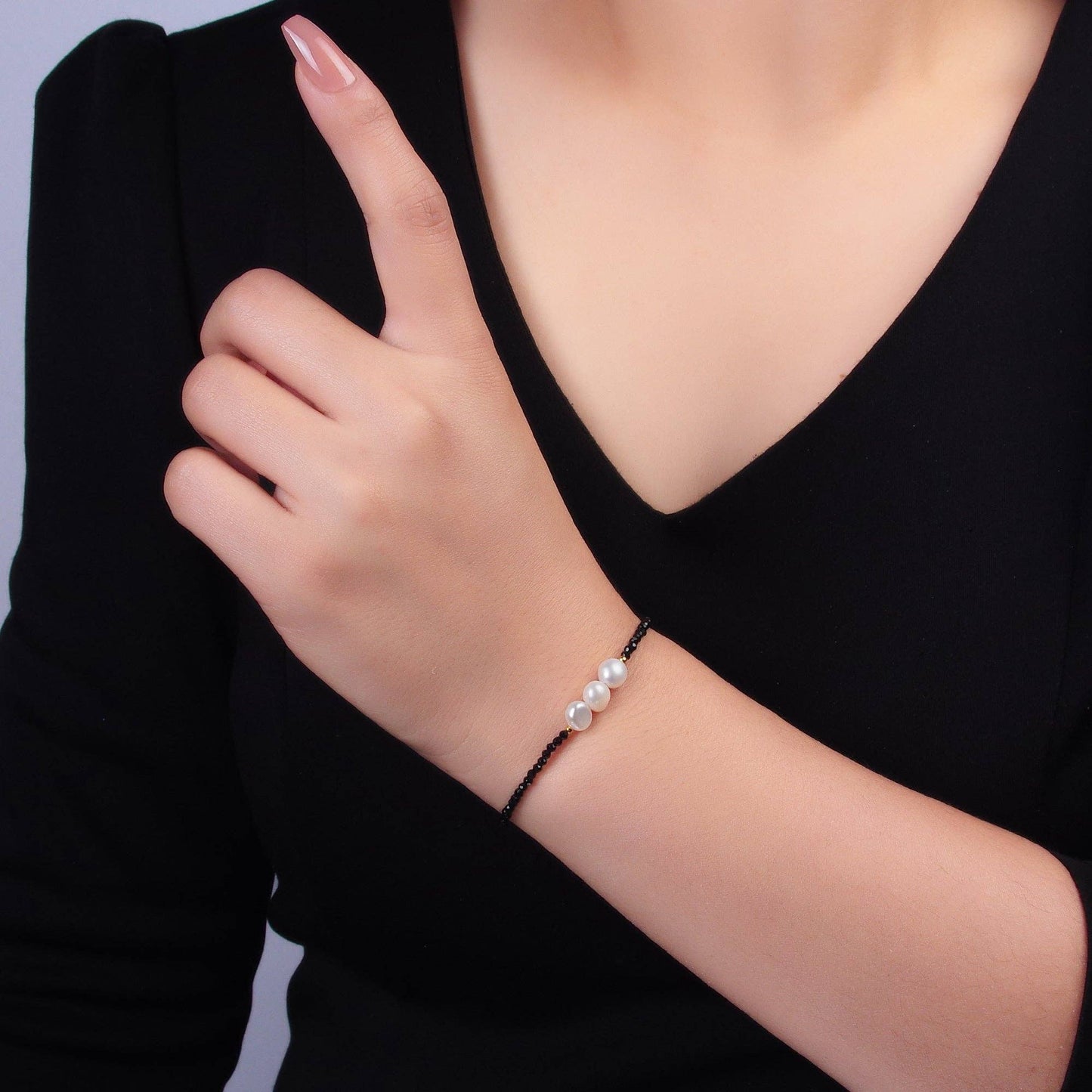 Triple Shell Pearl Onyx Bracelet